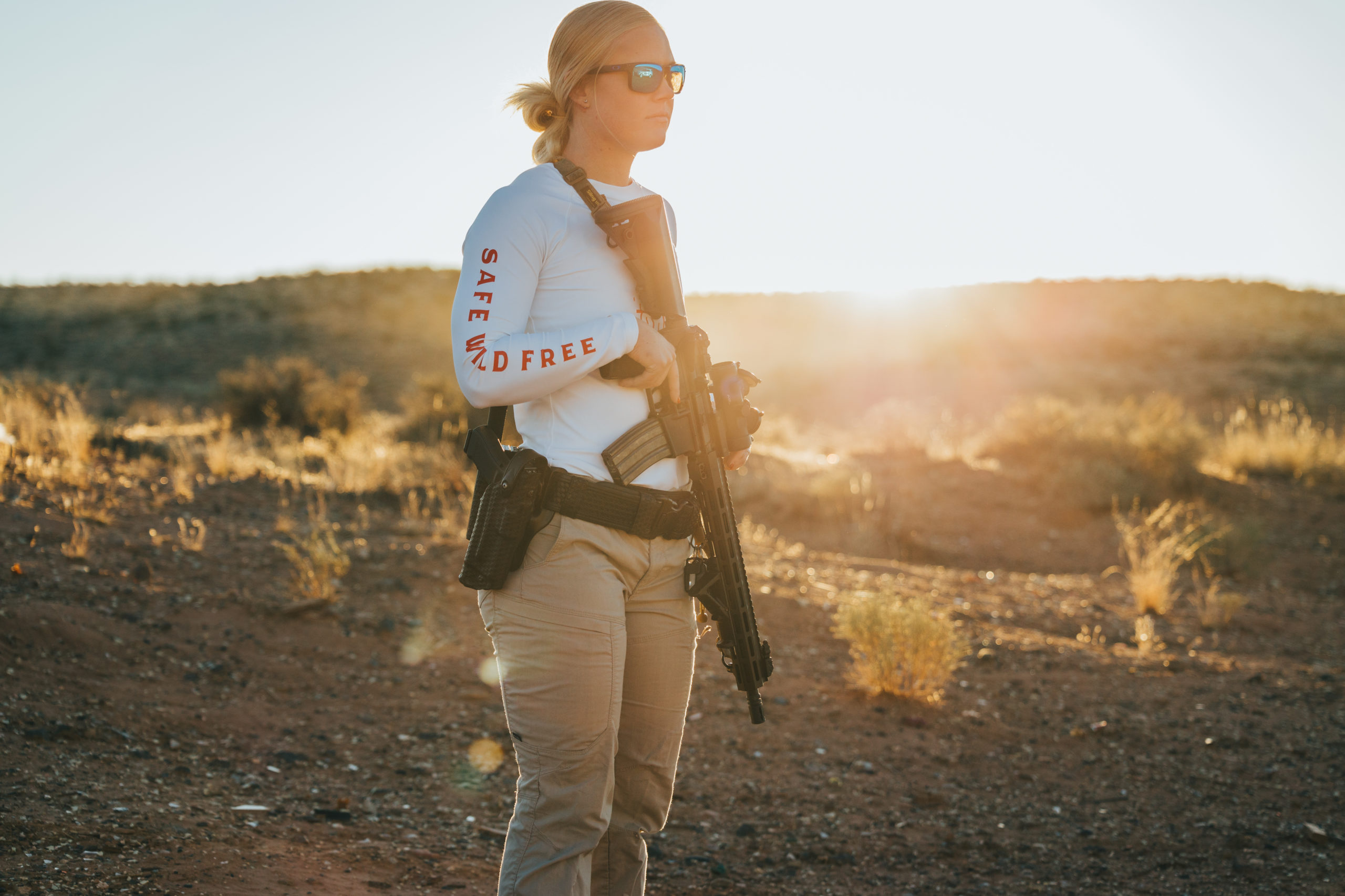 Young Desert Officer Wearing Red United States Hoodie